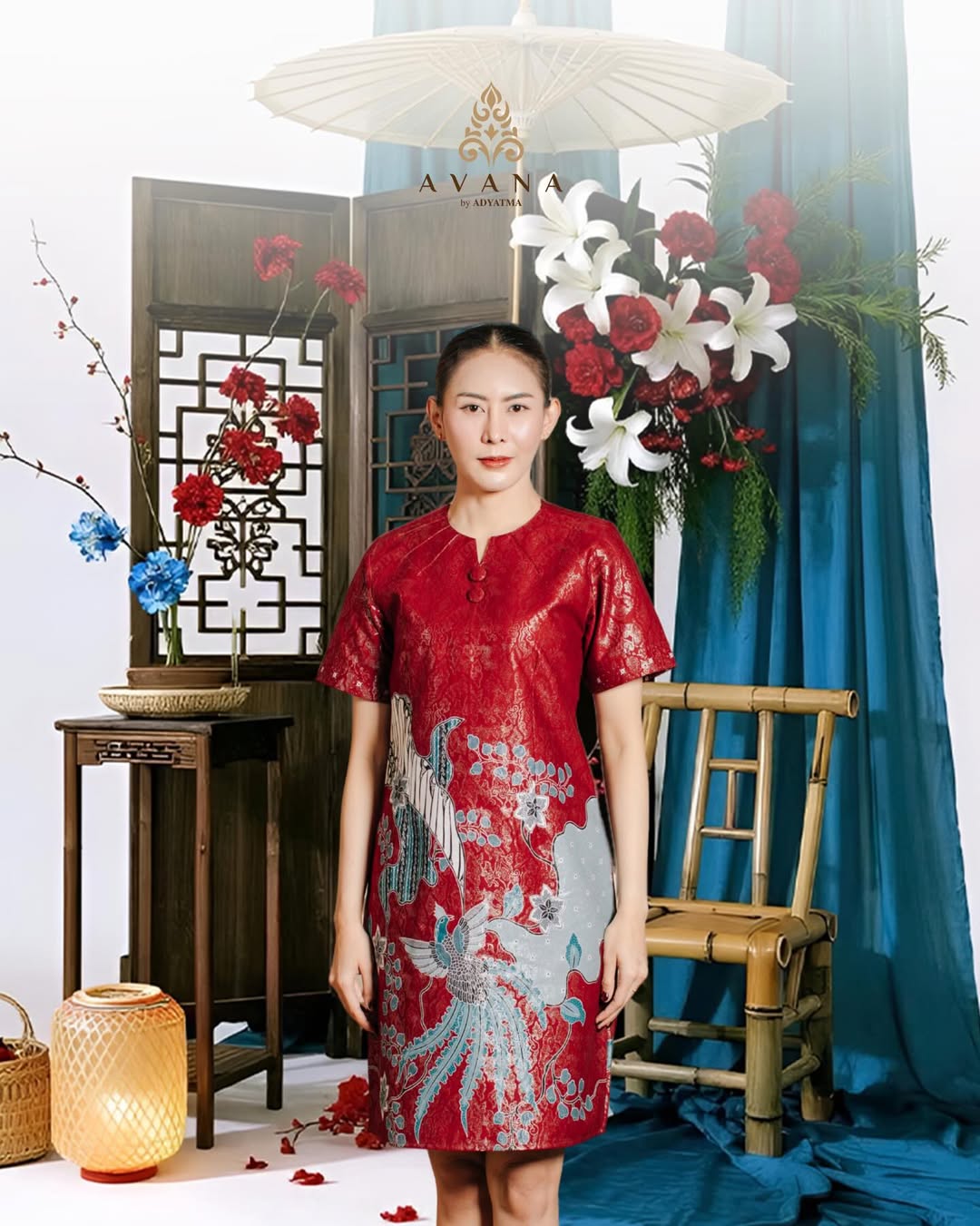 A woman in a shorter, softly patterned dress that blends traditional Chinese motifs with a minimalist design.