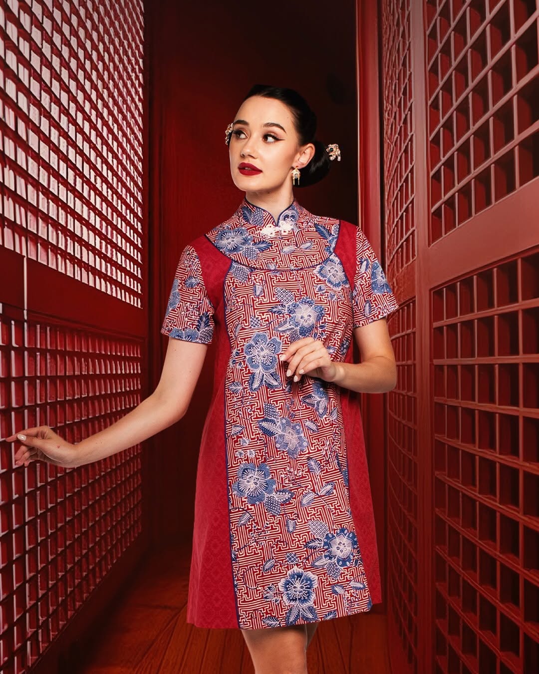 A flowing dress featuring traditional motifs in rich colors, balancing heritage with a contemporary, comfortable design.