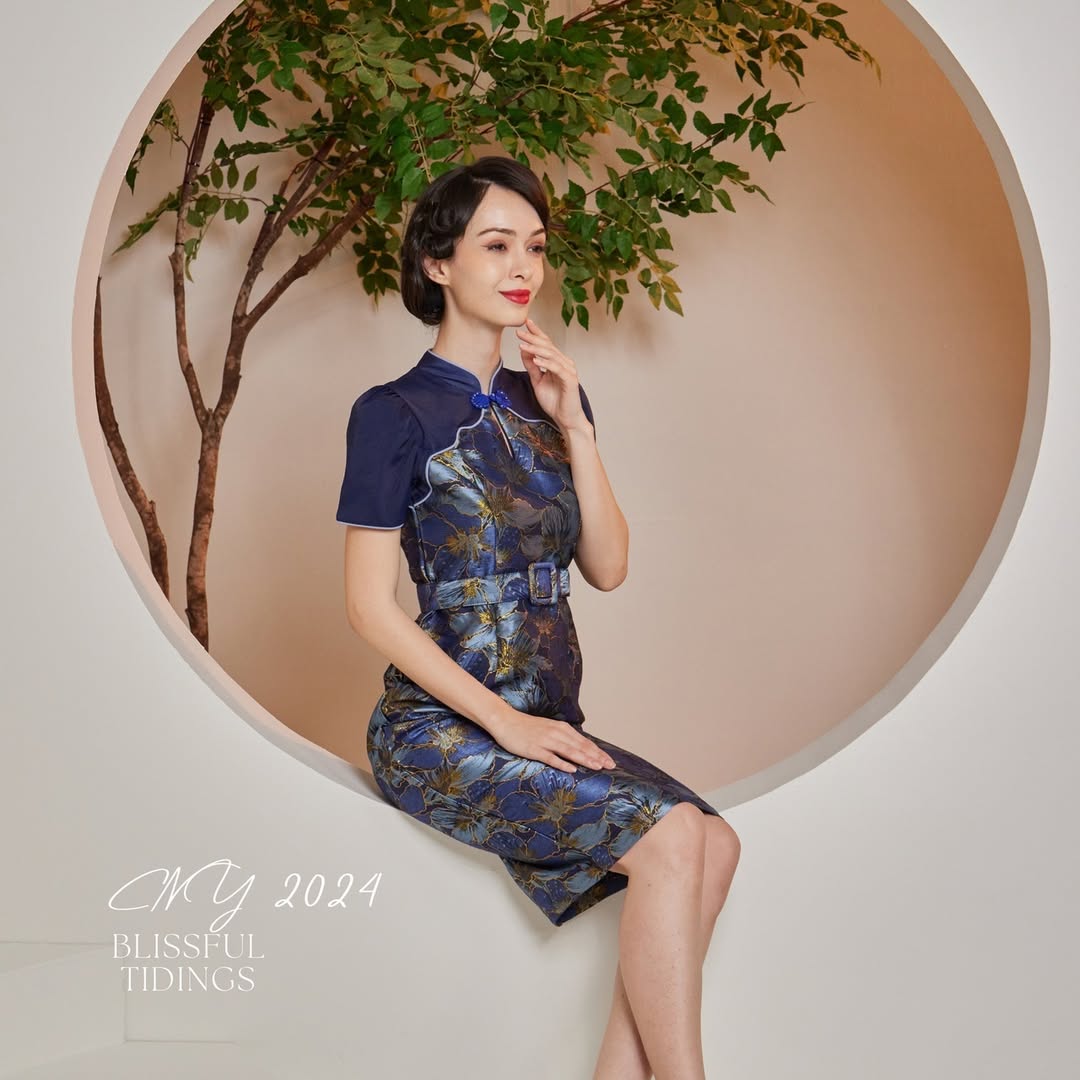 A contemporary Qipao dress with clean lines and a polished finish, embodying modern elegance.