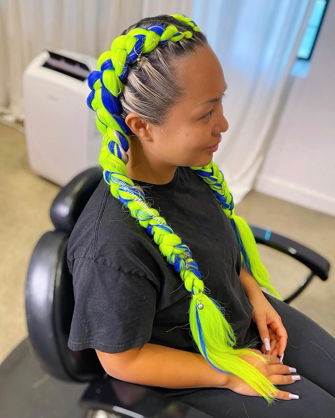 Bright neon braids as a statement hairstyle