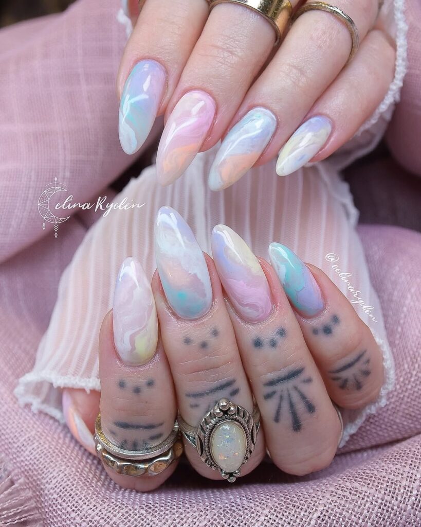 Opalescent finish nails with a soft, shifting pastel glow.