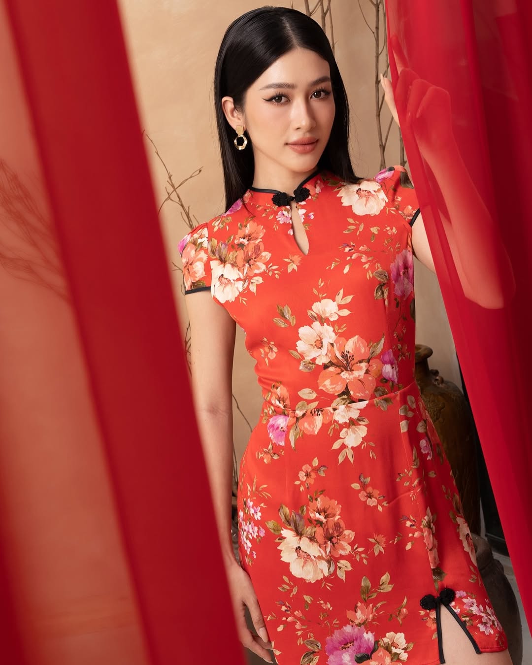 A youthful and fresh dress with a floral print and modern cut, perfect for casual and fun Lunar New Year gatherings.