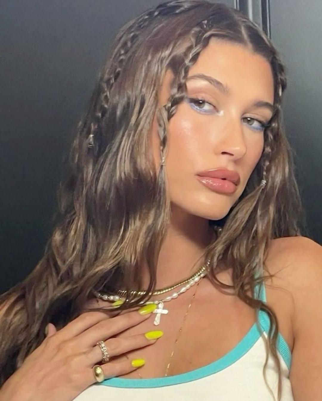 Immaculate micro braids pulled back neatly