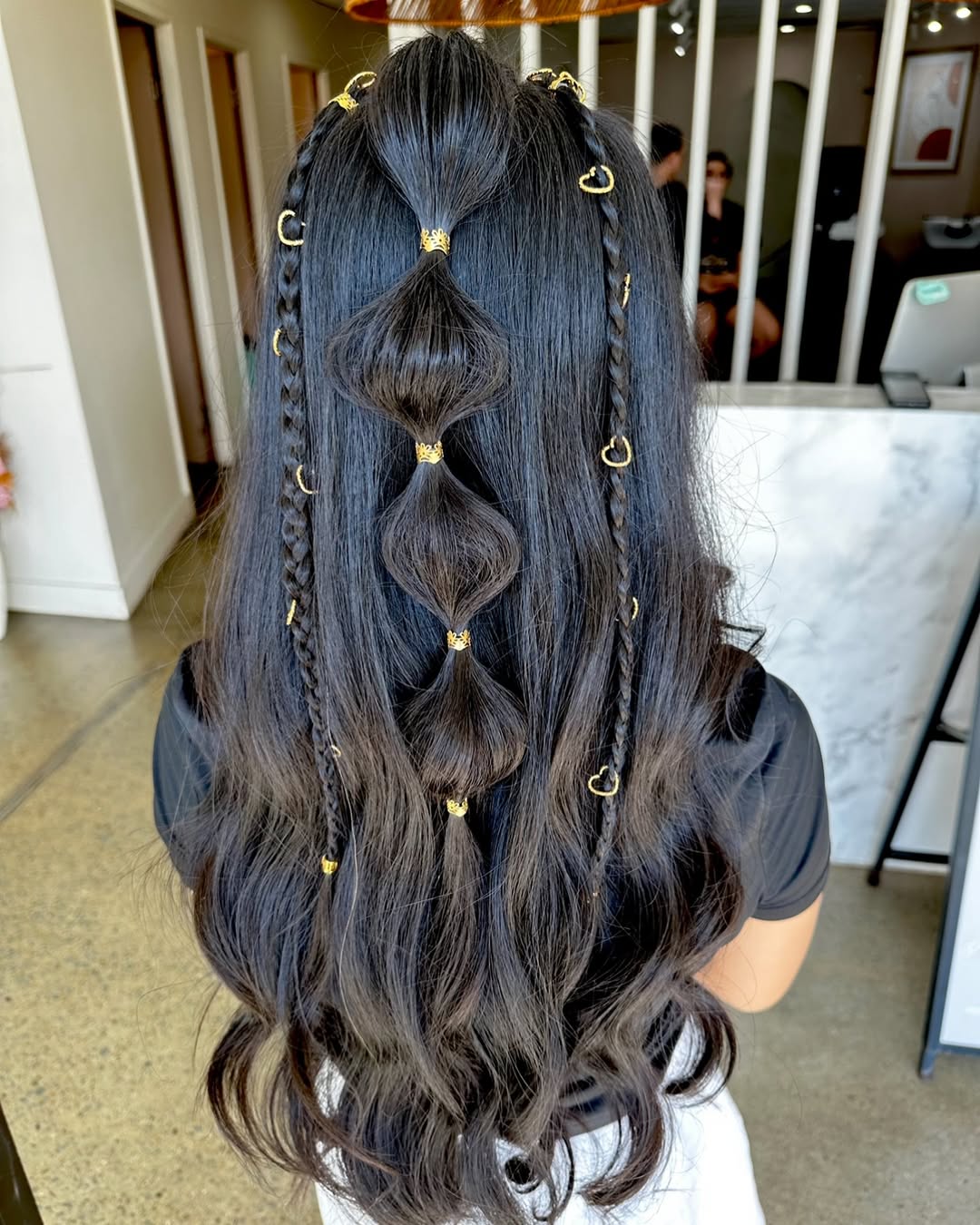 Soft braids decorated with subtle gold elements