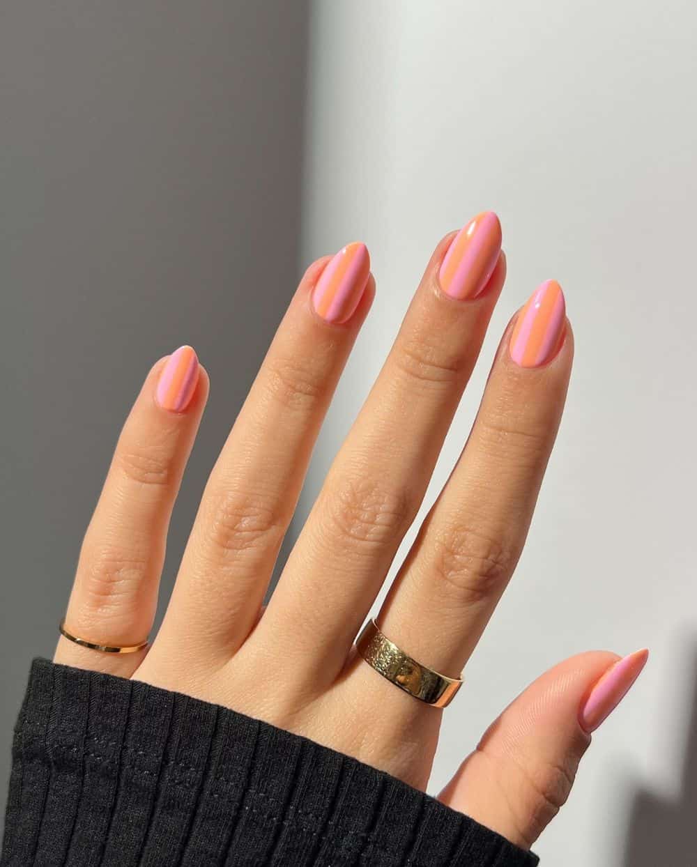 Pink and orange striped nails