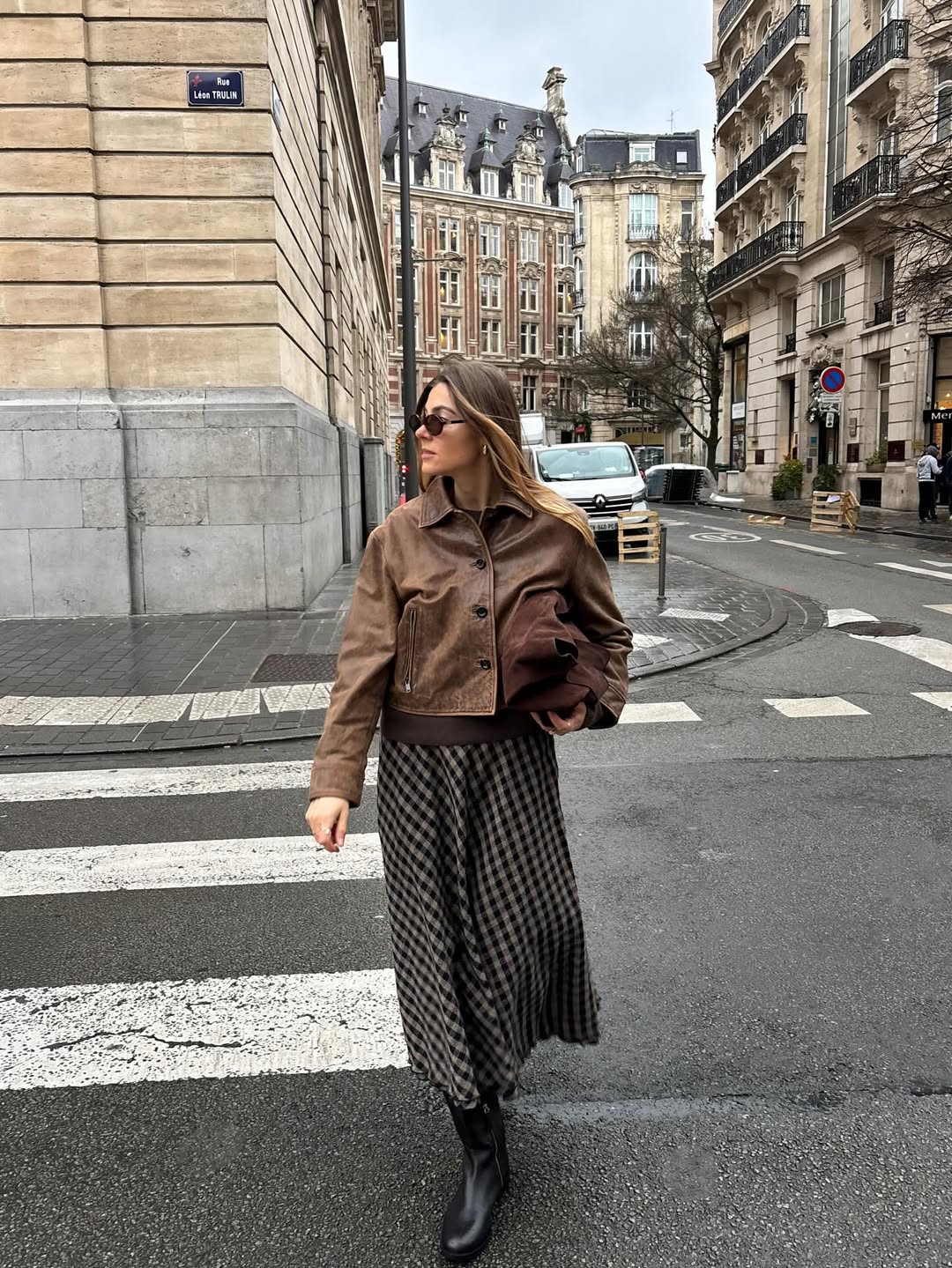 Leather jacket with plaid midi skirt