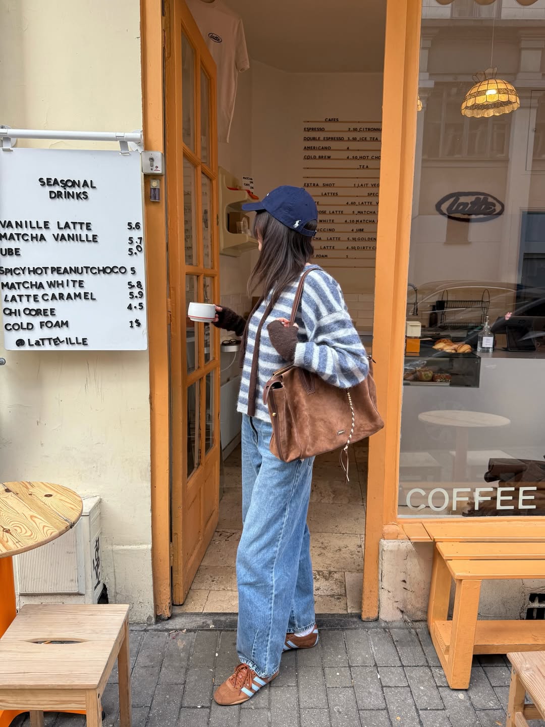 Striped sweater with wide-leg jeans