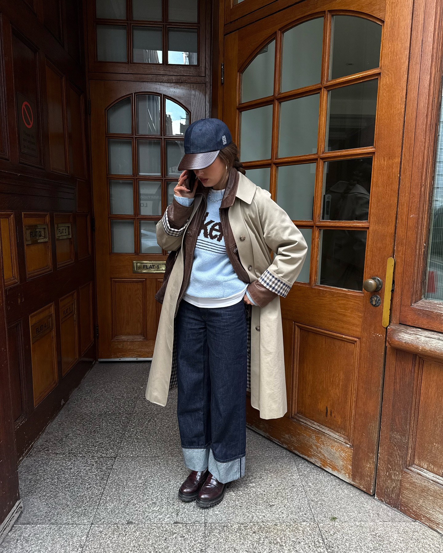 Trench coat and cuffed jeans outfit