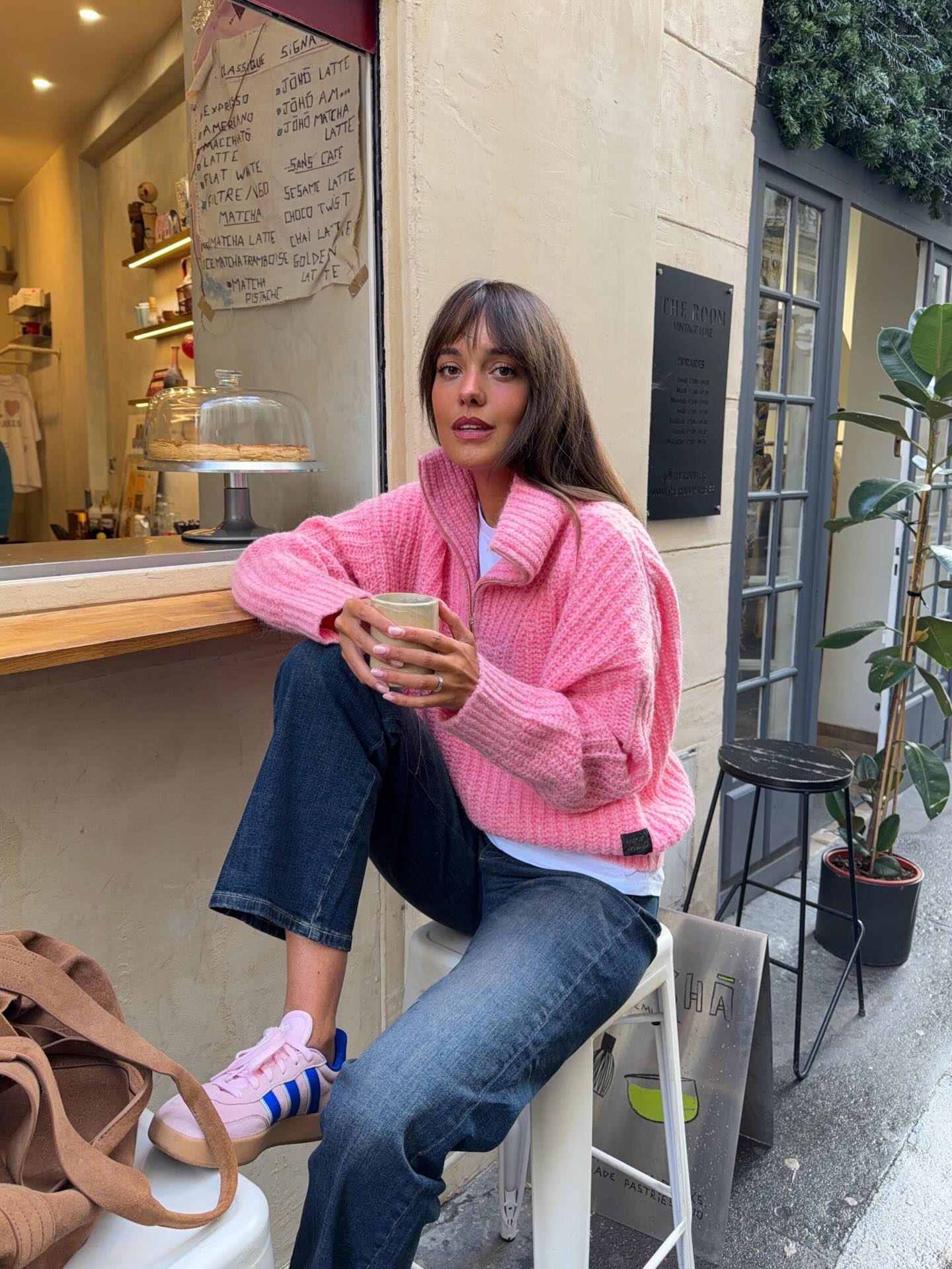 Pink zip sweater with relaxed jeans