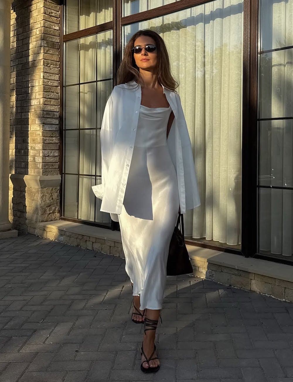 Woman in a white dress with textured details