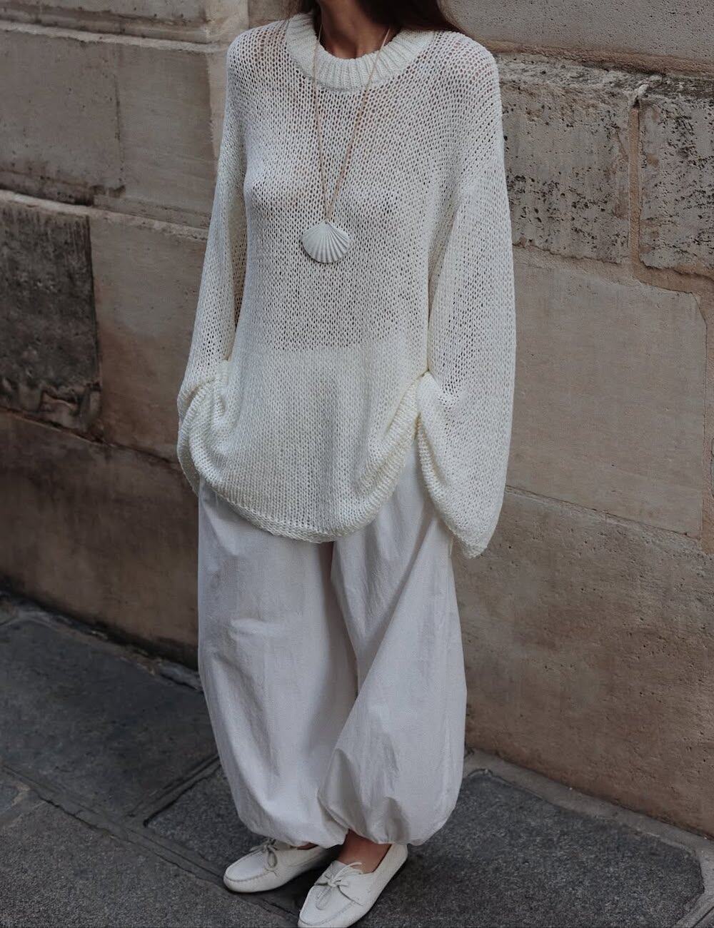 Woman in a white linen suit