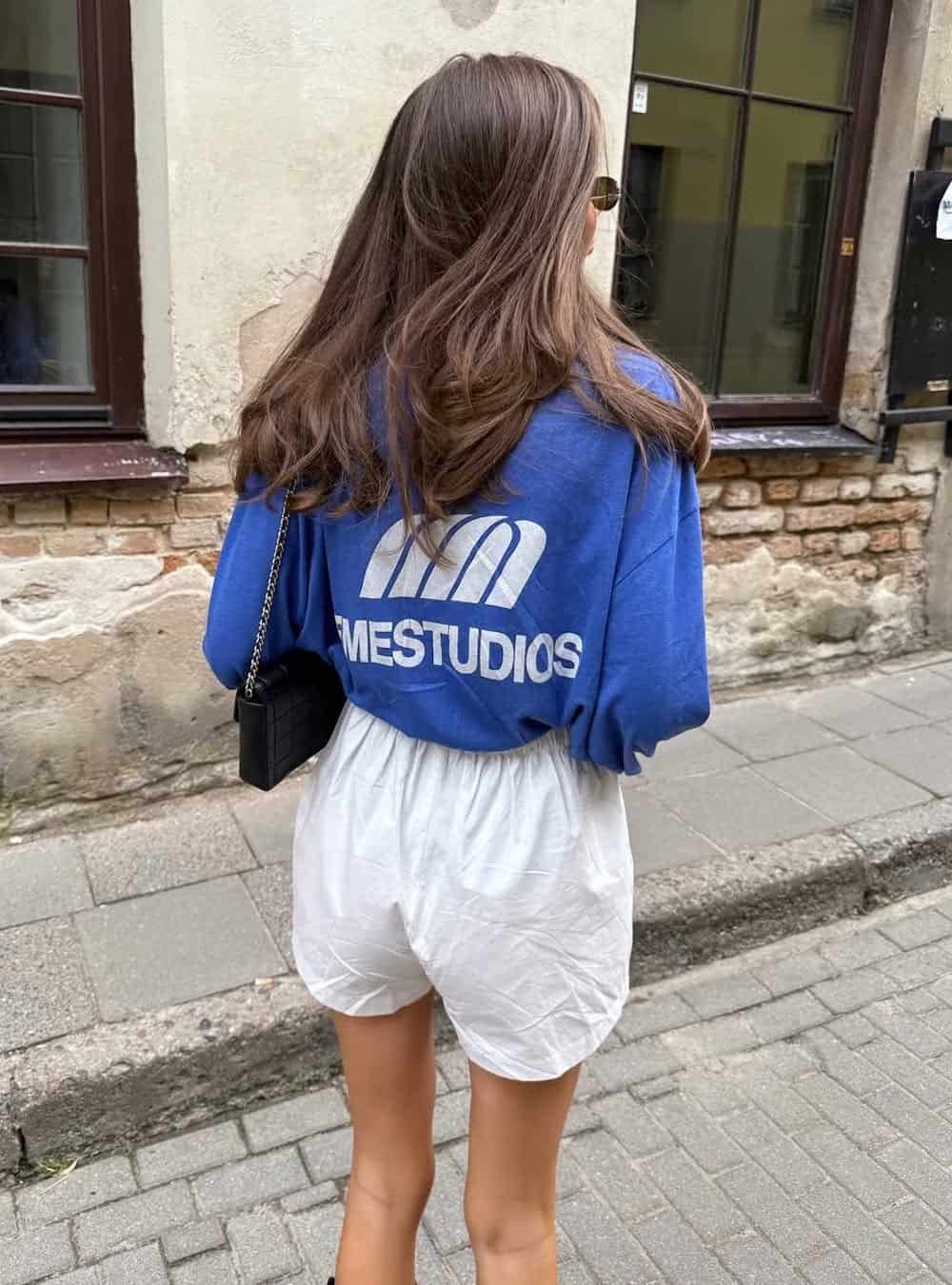 Woman in a sporty Y2K-inspired outfit