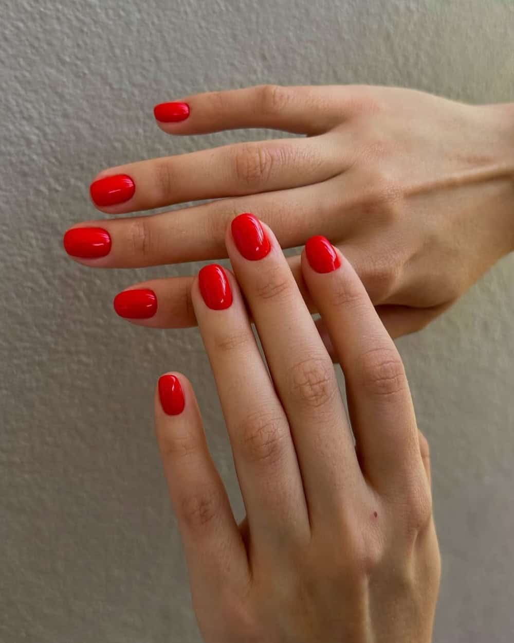 Short, classic red nails