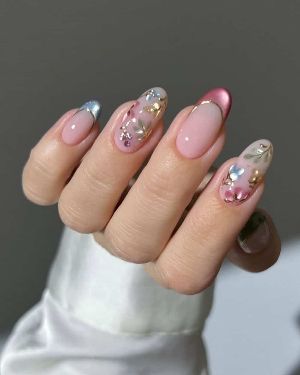 Magnetic cat-eye garden-inspired nails with gold accents