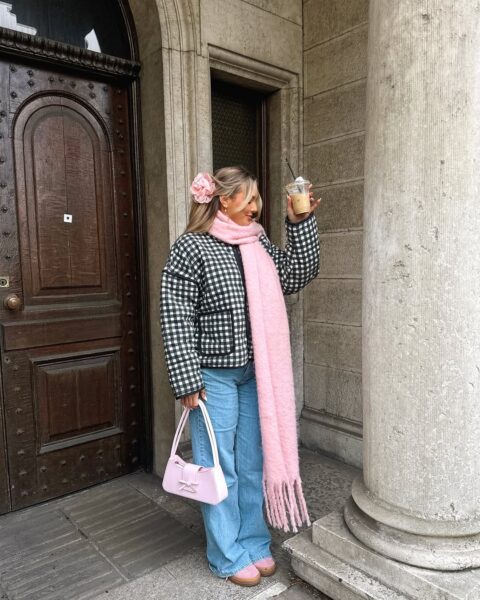 Gingham jacket, fuzzy jeans, and pink scarf.