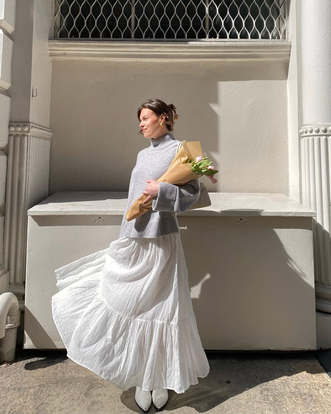 Gray turtleneck with a white tiered maxi skirt