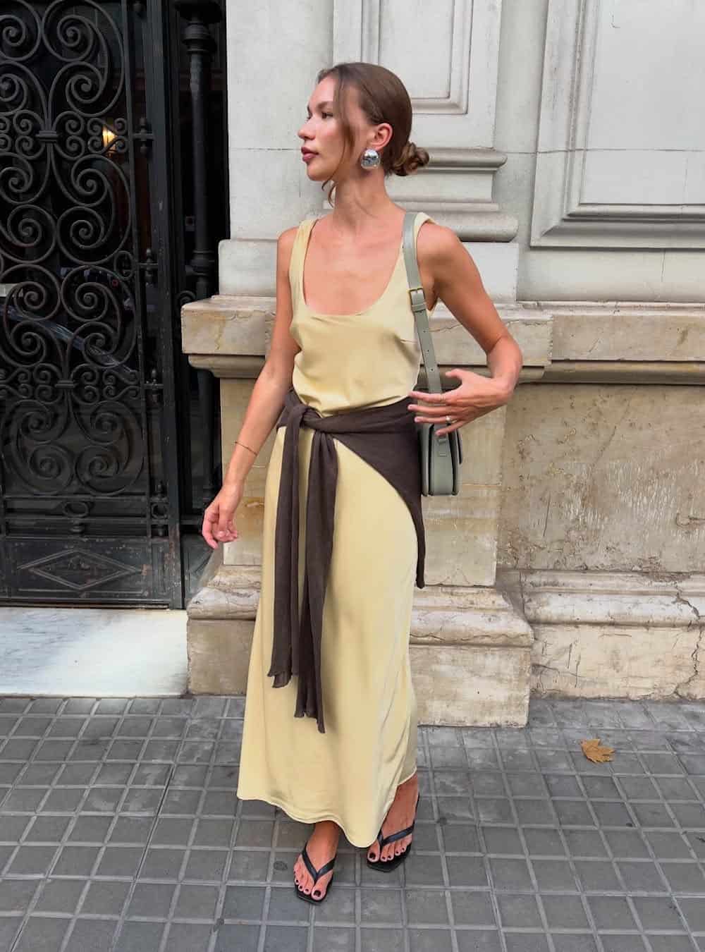 Woman wearing delicate heeled sandals