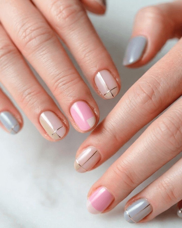 Baby pink nails with small bow details